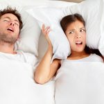 Snoring man – couple in bed