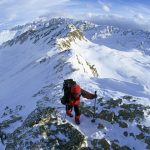 Woman just below the summit of Roter Kogel Sellrain Austria